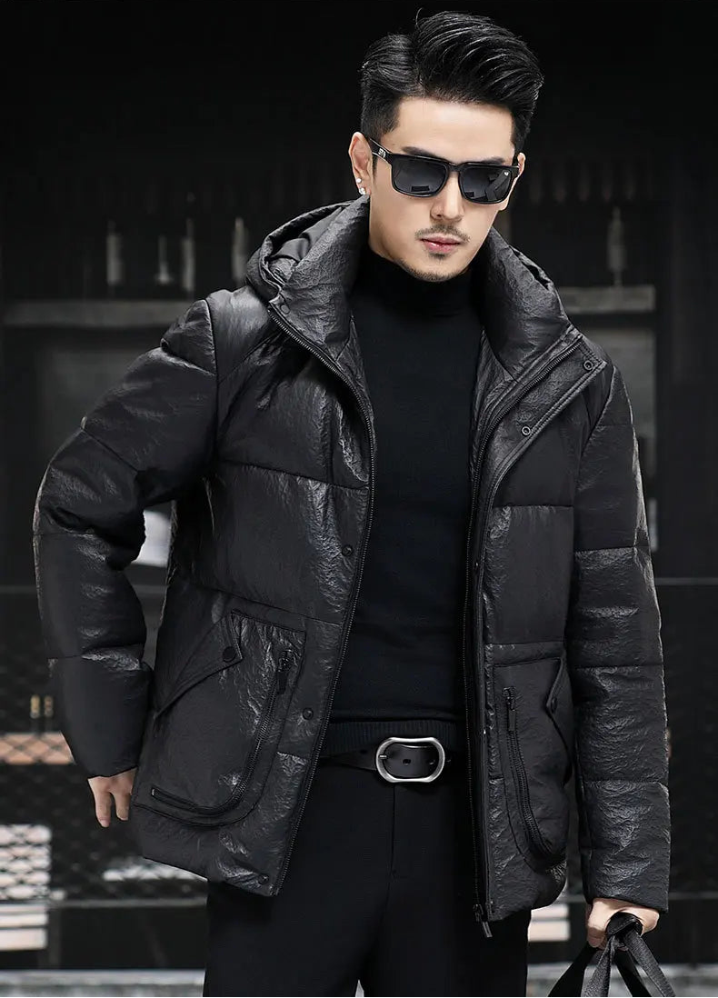 Model in the Onyx sheepskin jacket holding an oversized bag, showing styling versatility — From Borcelleclothes.