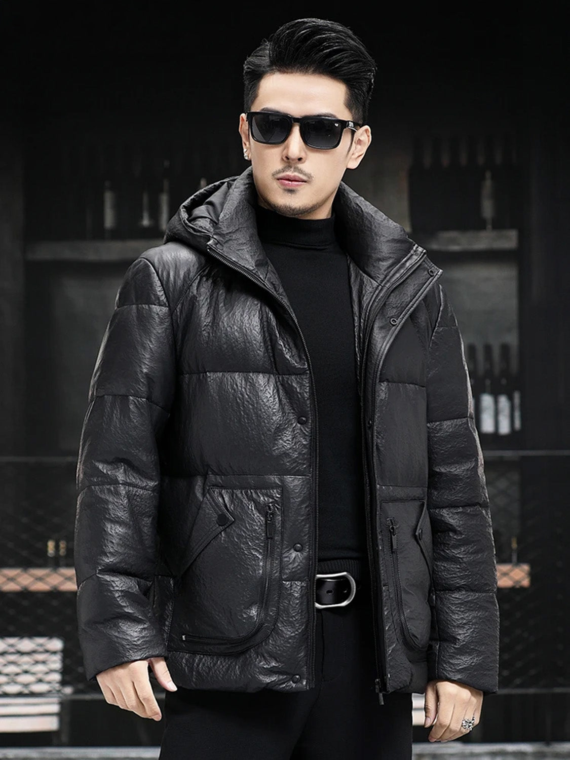 Unzipped sheepskin jacket in Onyx shown in profile, model looking to the side — From Borcelleclothes.