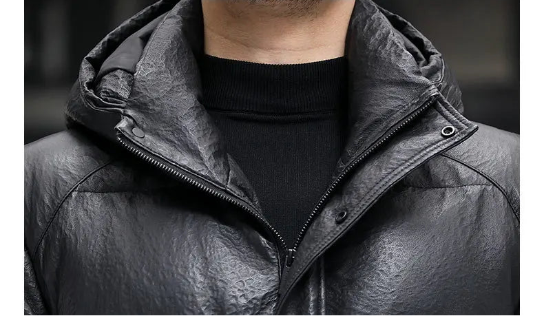 Close-up of the sculptural stand collar seamlessly integrated into the hood — From Borcelleclothes.