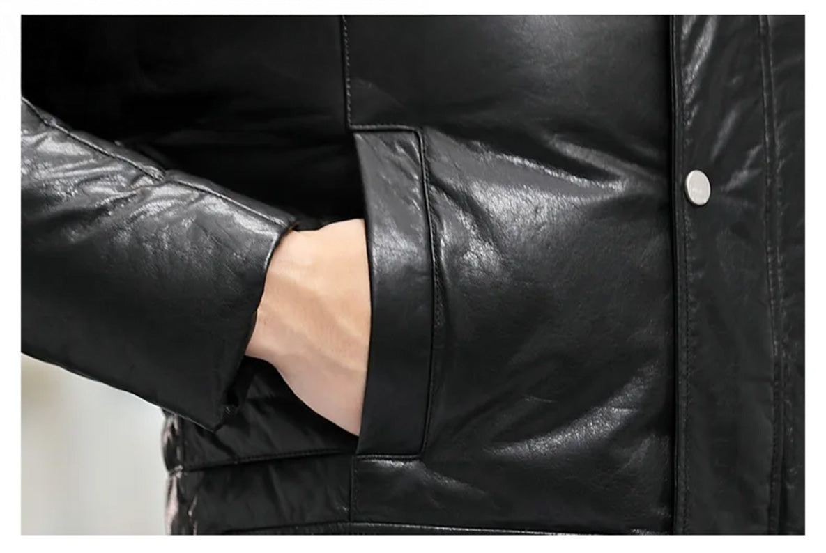 Model with hand resting on the chest pocket of the men’s cowhide coat in Onyx — From Borcelleclothes.