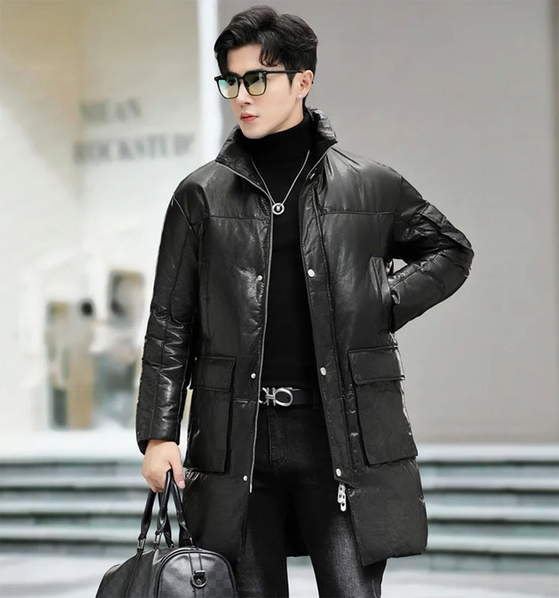 Modelwith hand in the chest pocket of the men’s cowhide coat with cargo pockets in Onyx — From Borcelleclothes.