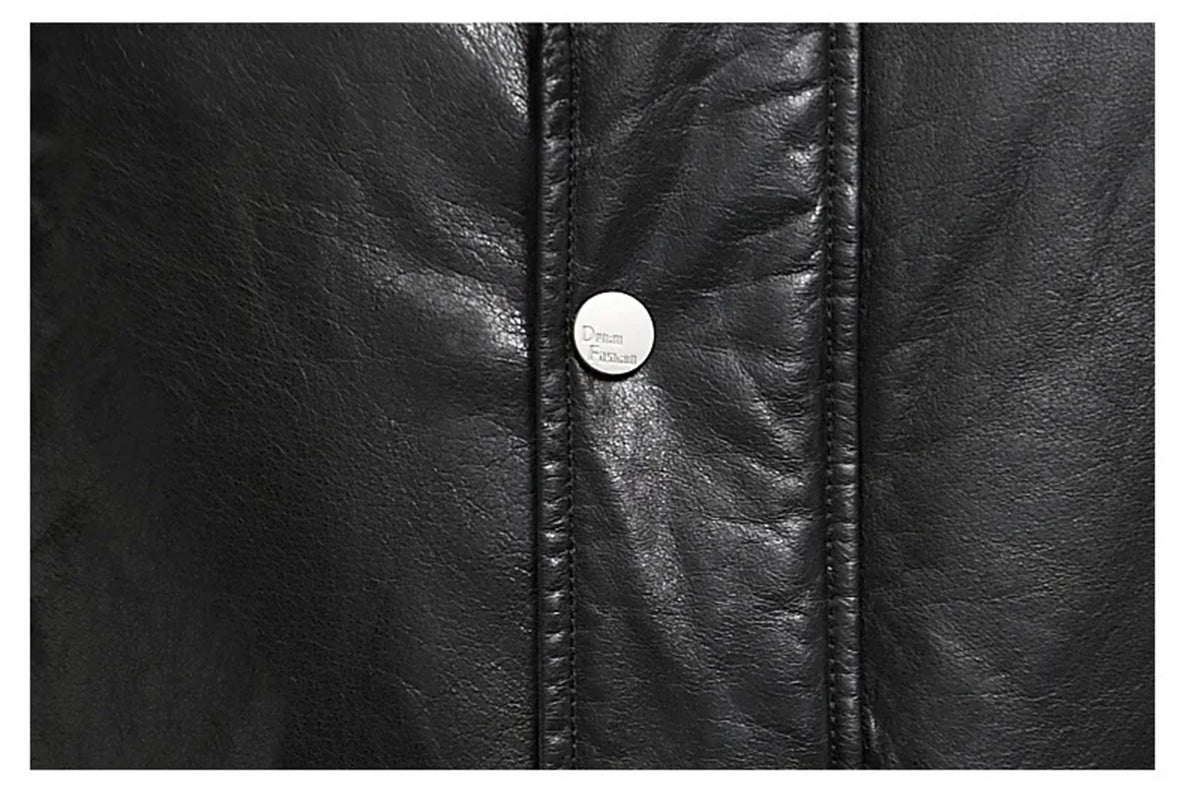 Detail of the snap placket section on the Onyx cowhide coat — From Borcelleclothes.