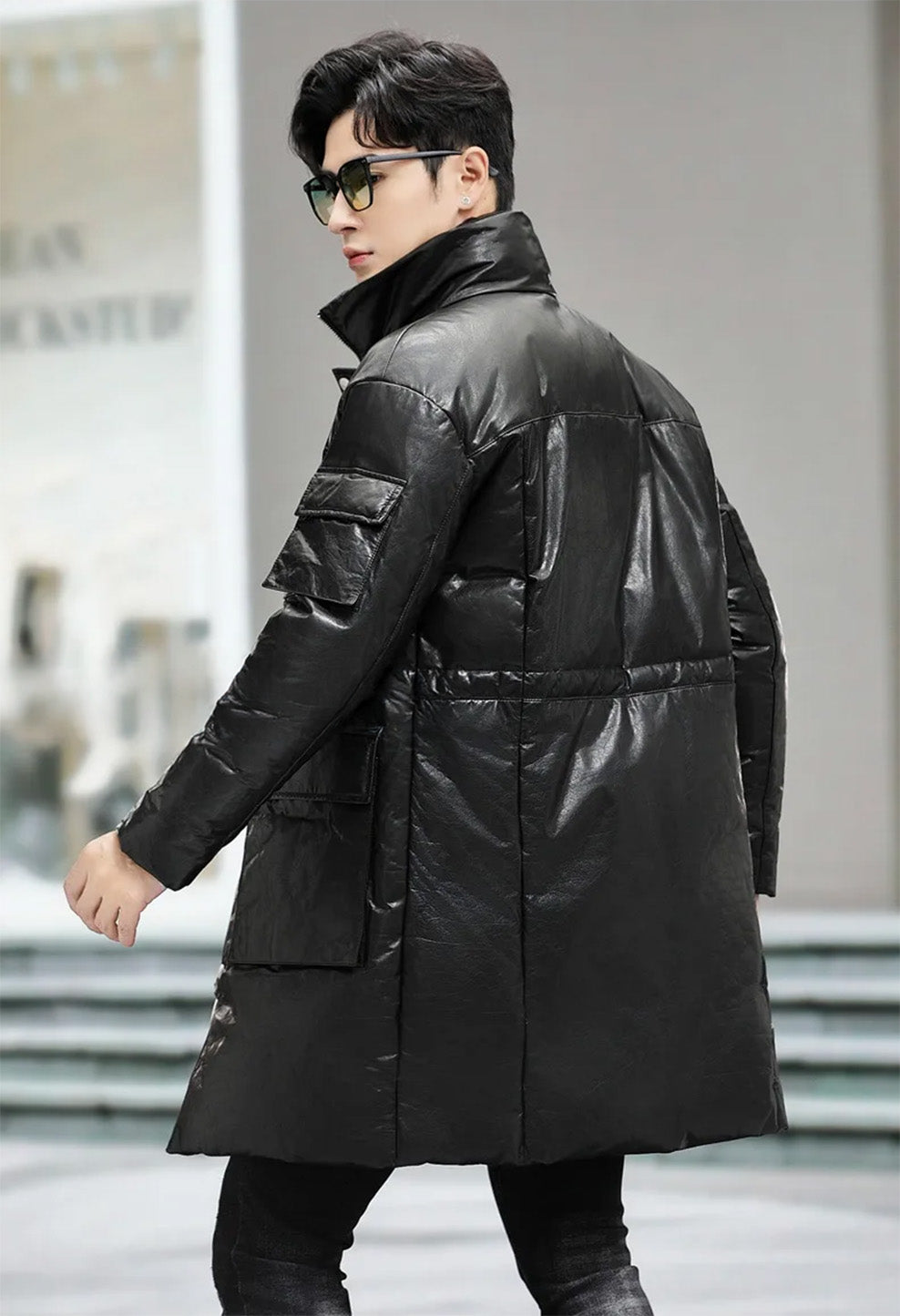Back view of the unzipped Onyx cowhide coat, worn by the model — From Borcelleclothes.