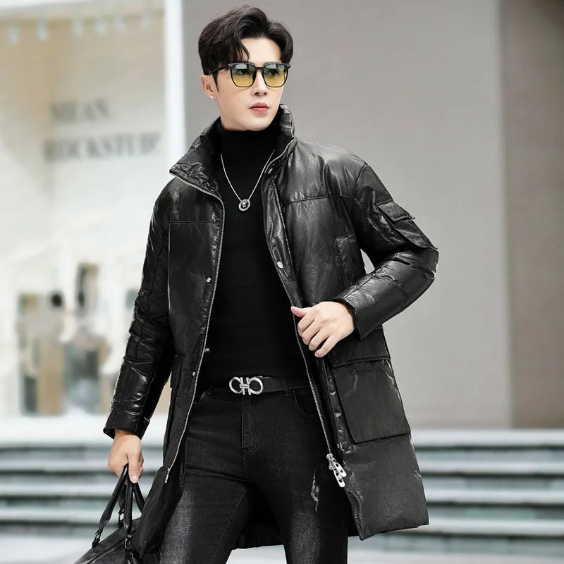 Men’s structured cowhide coat in Onyx, with cargo pockets, stand collar, and two-way zipper. Goose down insulation. From Borcelleclothes.