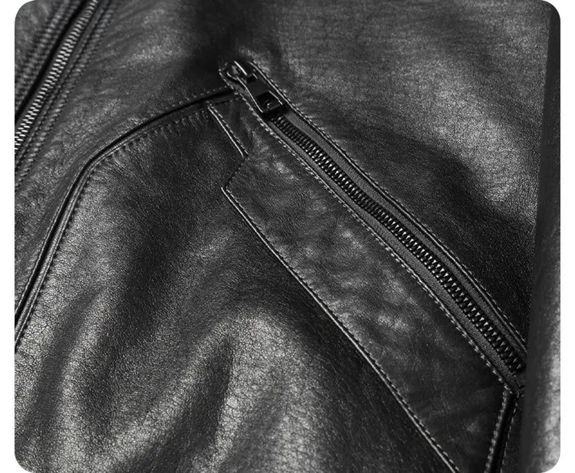 Detail of the curved patch pocket with piping and decorative overlay on the Onyx cowhide coat. — From Borcelleclothes.