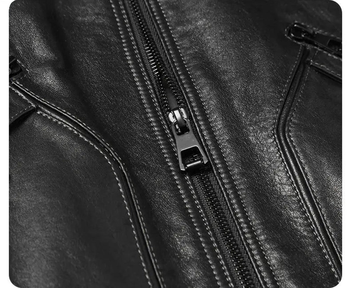 Close-up of piped patch pocket sections and zipper puller on the Onyx cowhide coat. — From Borcelleclothes.