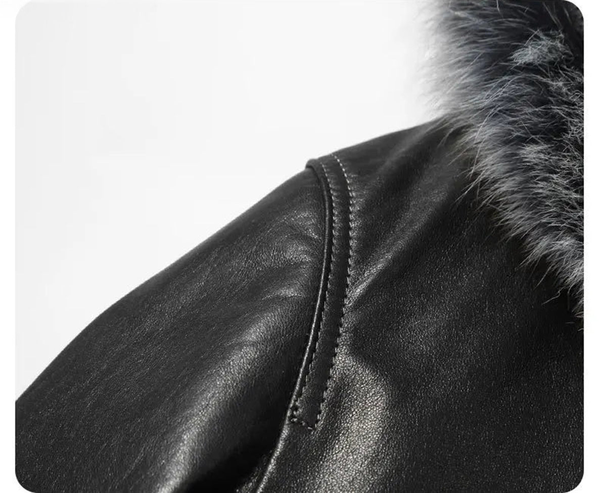 Shoulder detail of the Onyx cowhide coat highlighting smooth cowhide leather and stitched shaping. — From Borcelleclothes.