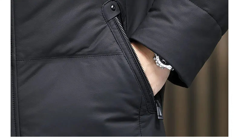 Model placing hand in diagonal side zip pocket of the cowhide coat — From Borcelleclothes.