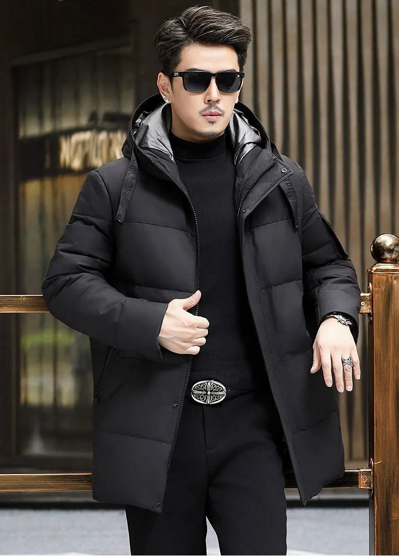 Model with hand on railing, wearing the Abyss cowhide down coat — From Borcelleclothes.