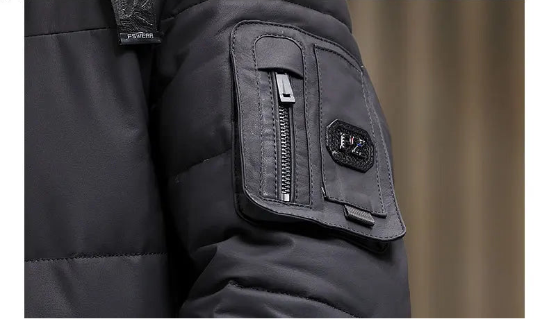 Left arm sleeve pocket with tonal badge and ribbon loop — From Borcelleclothes.