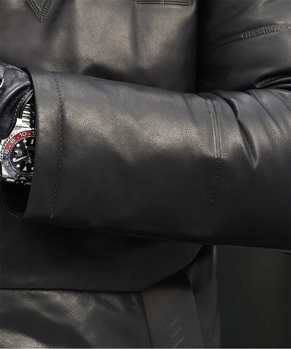Detail of the sleeve cuff and texture of the embossed cowhide in Onyx. — From Borcelleclothes.