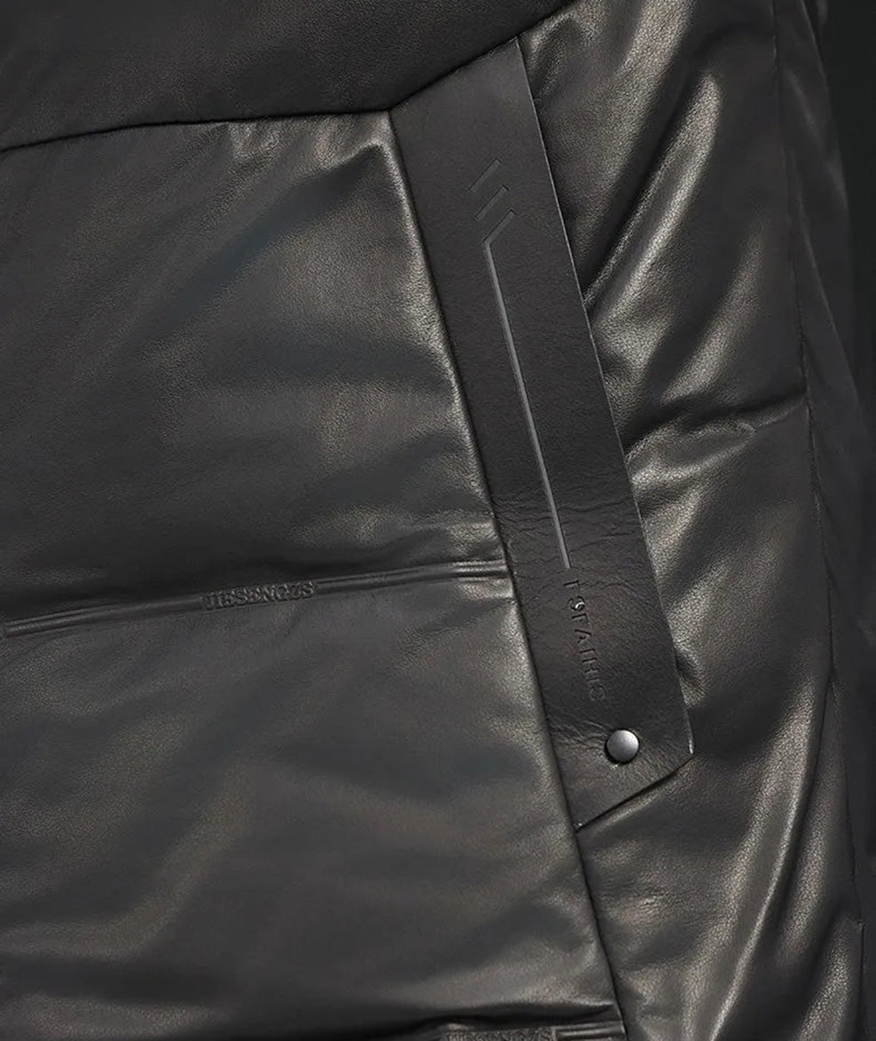Welt pocket of the Onyx cowhide down coat with rubberized pattern around the surface. — From Borcelleclothes.