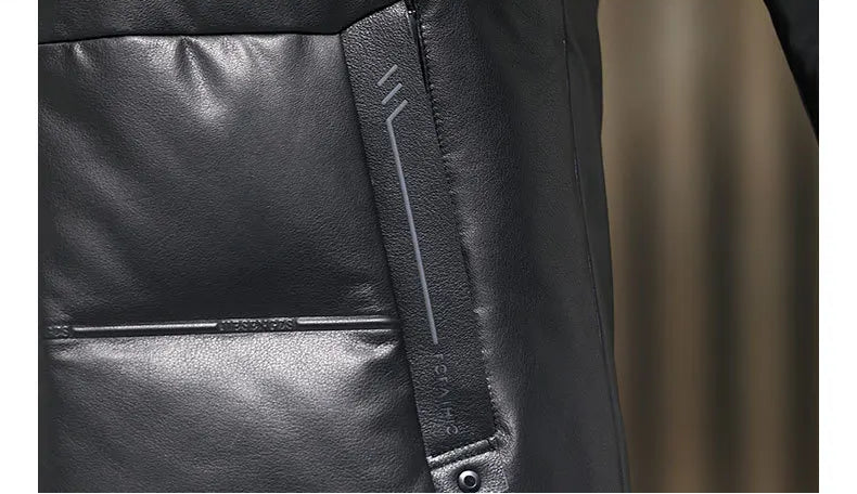 Welt pocket of the Onyx cowhide down coat with rubberized pattern around the surface. — From Borcelleclothes.