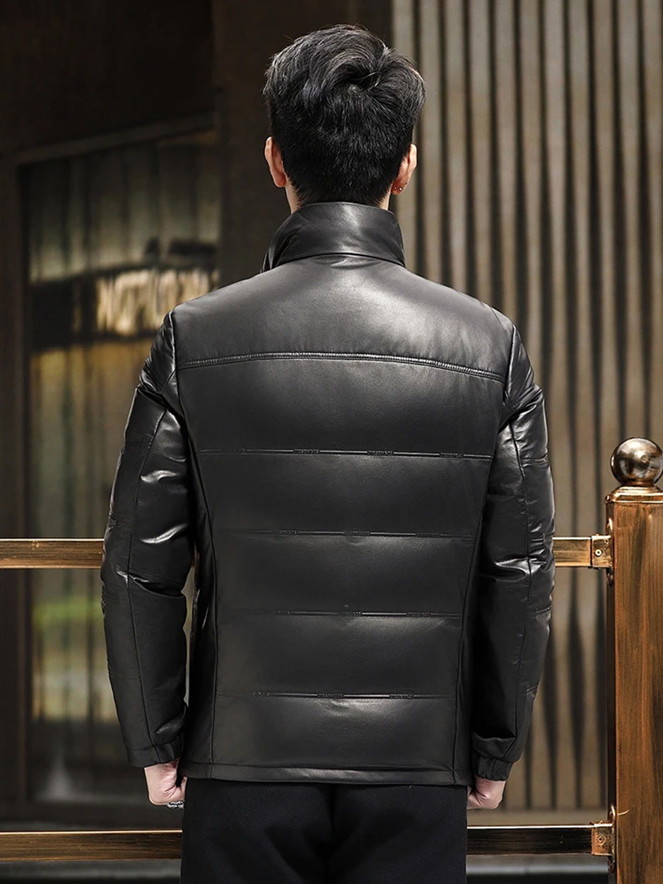 Back view of cowhide leather jacket with clean yoke and tonal embossed texture — From Borcelleclothes.