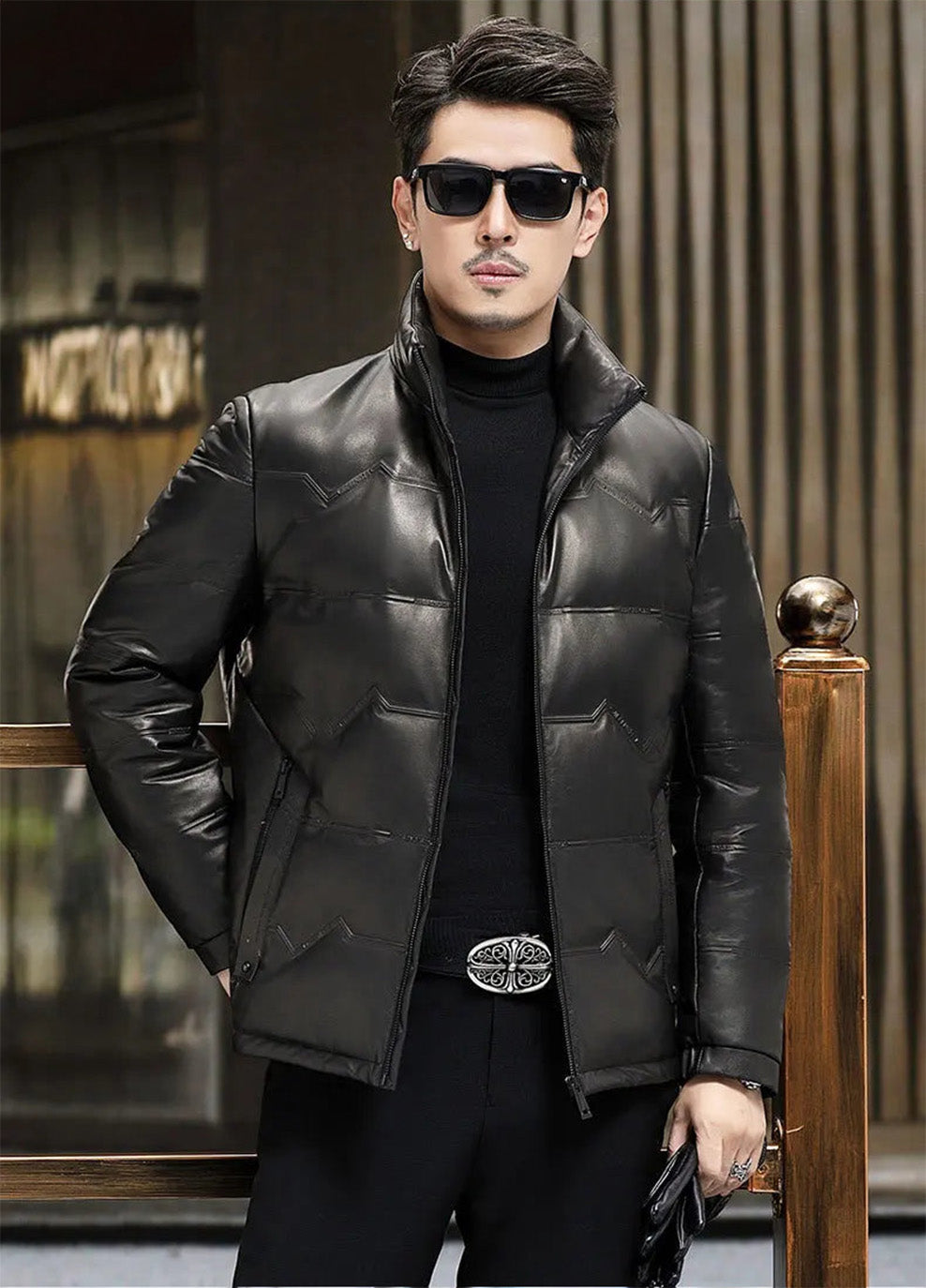 Model with hand behind back, showing structured lines of embossed cowhide jacket — From Borcelleclothes.