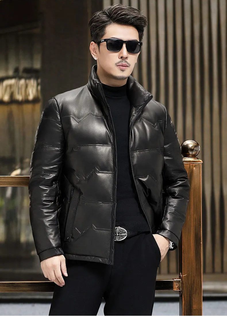 Man’s hand in pants pocket, styled in Onyx cowhide jacket with alternating embossed motifs — From Borcelleclothes.