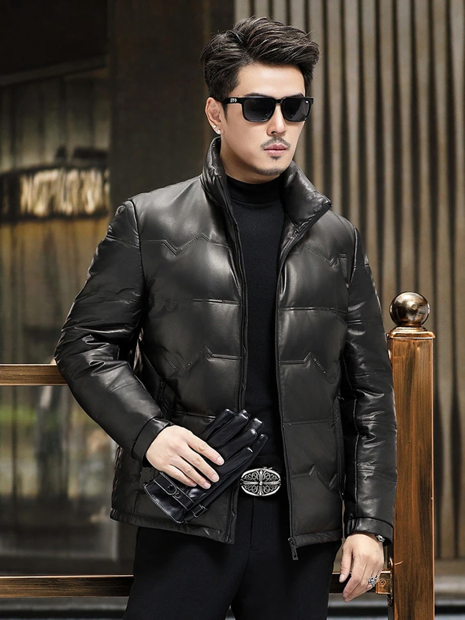 Man wearing Onyx cowhide jacket with zigzag pattern, holding gloves in one hand — From Borcelleclothes.