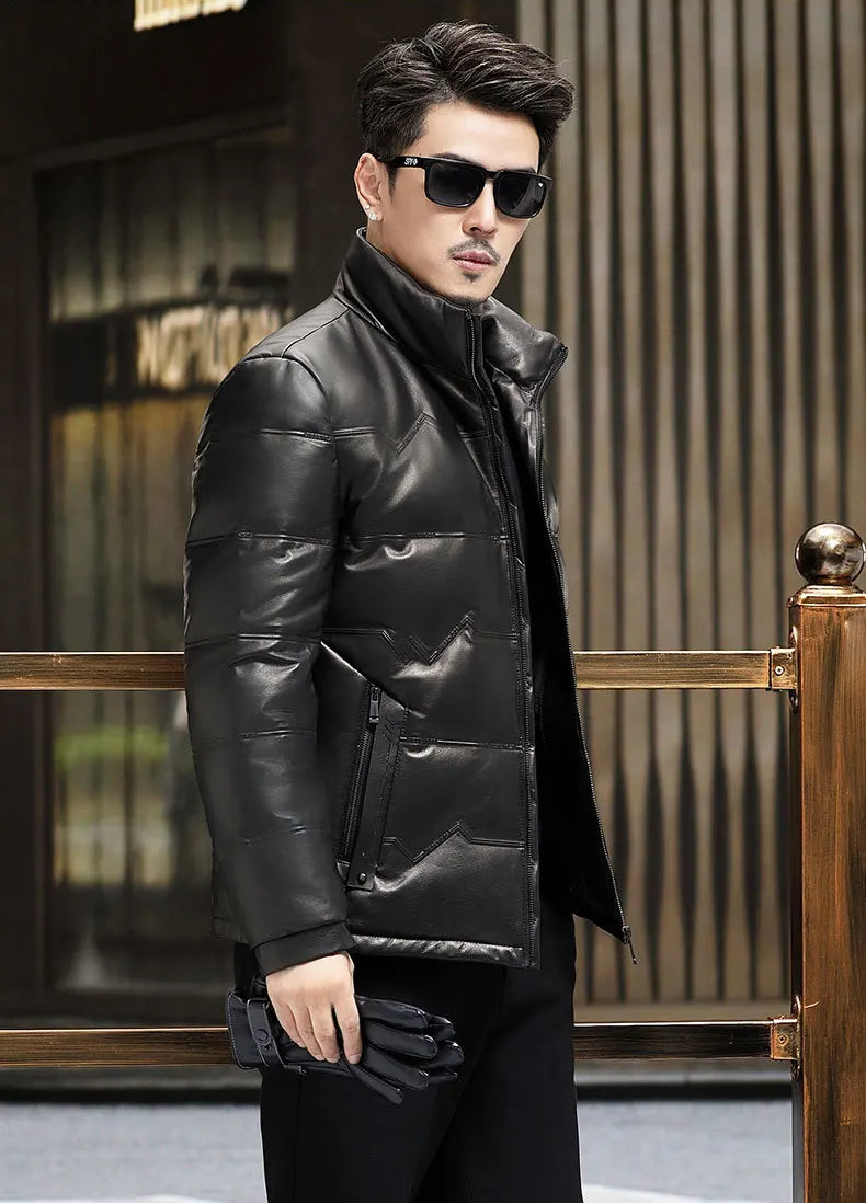 Man turned slightly sideways in structured cowhide jacket with front zigzag pattern — From Borcelleclothes.