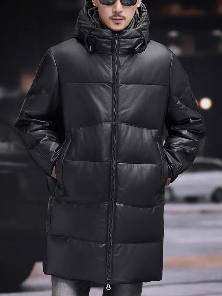 Model with hands in pockets wearing men’s cowhide leather coat with unified collar-hood in Onyx. From Borcelleclothes.