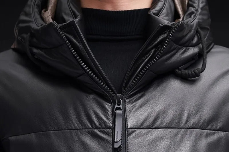Close-up of unified collar-hood design on partially unzipped cowhide coat in Onyx. From Borcelleclothes.