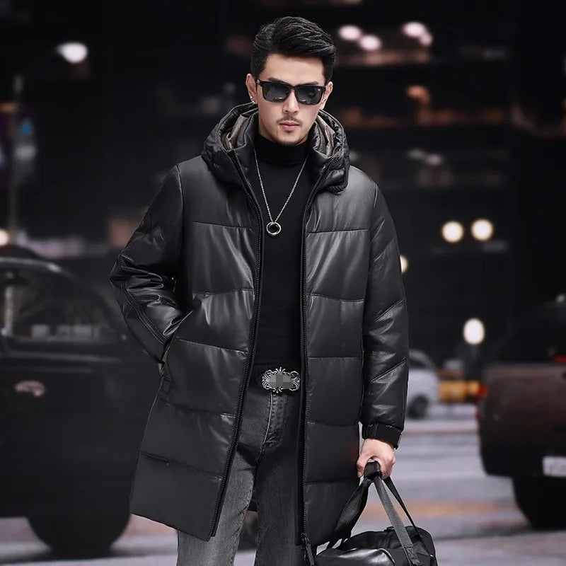 Men’s leather down coat in Onyx — featuring a sculpted stand collar integrated into a hood, side zip pockets, and matte metal-detailed cuffs. From Borcelleclothes.