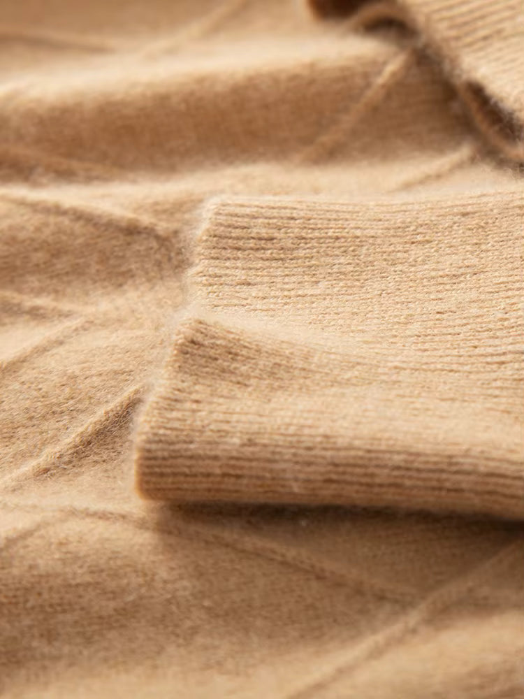 Both cuffs of the men’s diamond-stitch cashmere sweater in Impulse, highlighting symmetrical ribbed finishes — From Borcelleclothes.