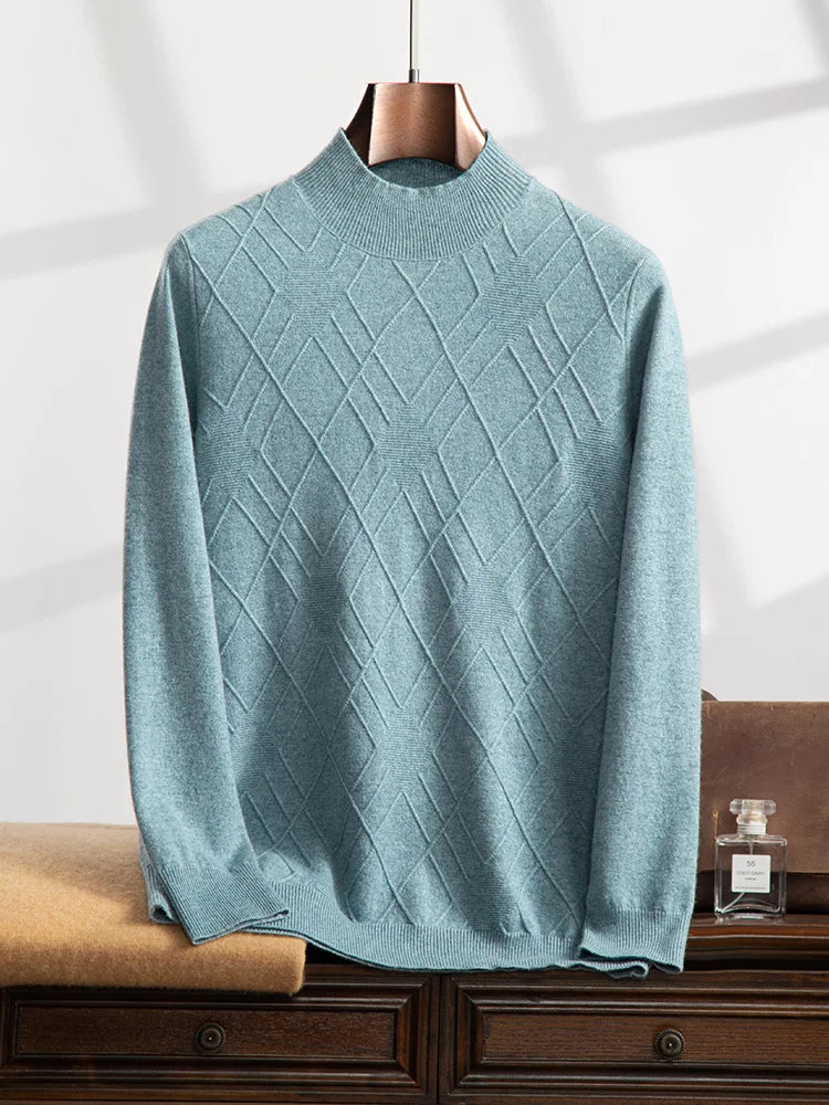 Men’s cashmere sweater in Tropical Sea, with a diamond-stitch pattern across the chest; each rhombus contains a cross-shaped structure with a central purl-knit center — From Borcelleclothes.