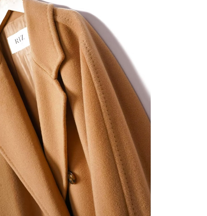 The shoulder construction of the Men’s Double-Breasted Belted Cashmere Coat in Whiskey, emphasizing its seamless tailoring and relaxed structure. From Borcelleclothes.