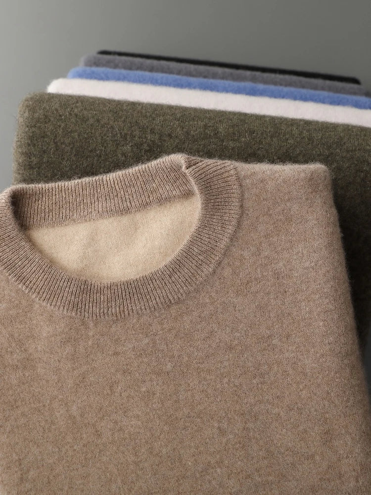Folded Beigewood sweater stacked above the full double-knit cashmere collection — From Borcelleclothes.