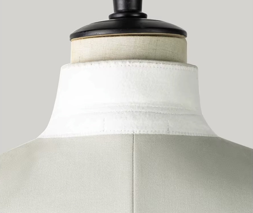 The undercollar on the Borcelleclothes Men's Ecru White Suit blazer, highlighting the meticulous tailoring and structured fit.