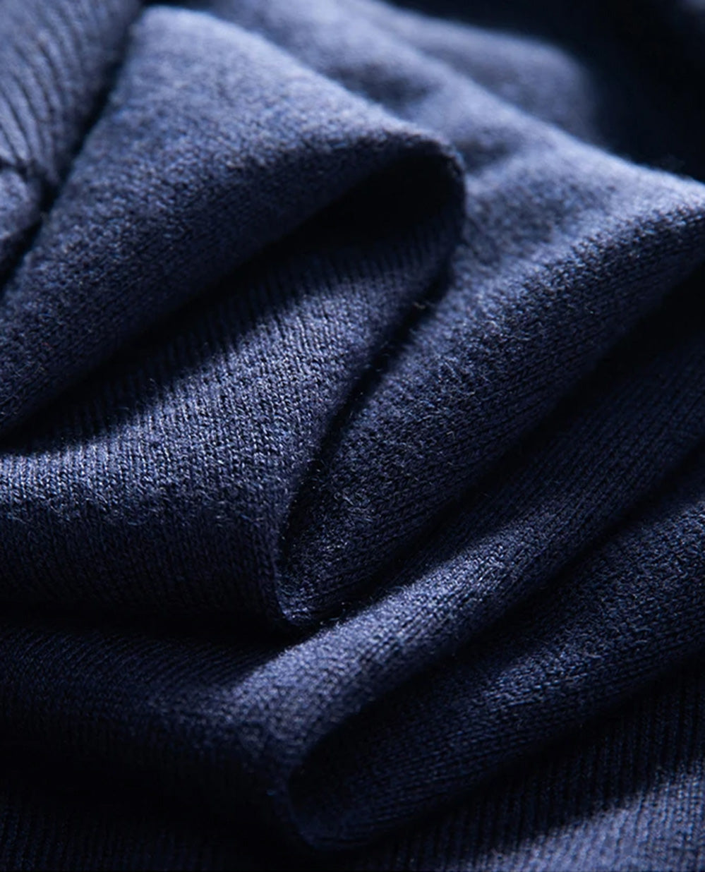 Men’s fine-knit silk-cashmere T-shirt in Midnight Express – wave fold reveals the soft, fluid texture of the knit. From Borcelleclothes.