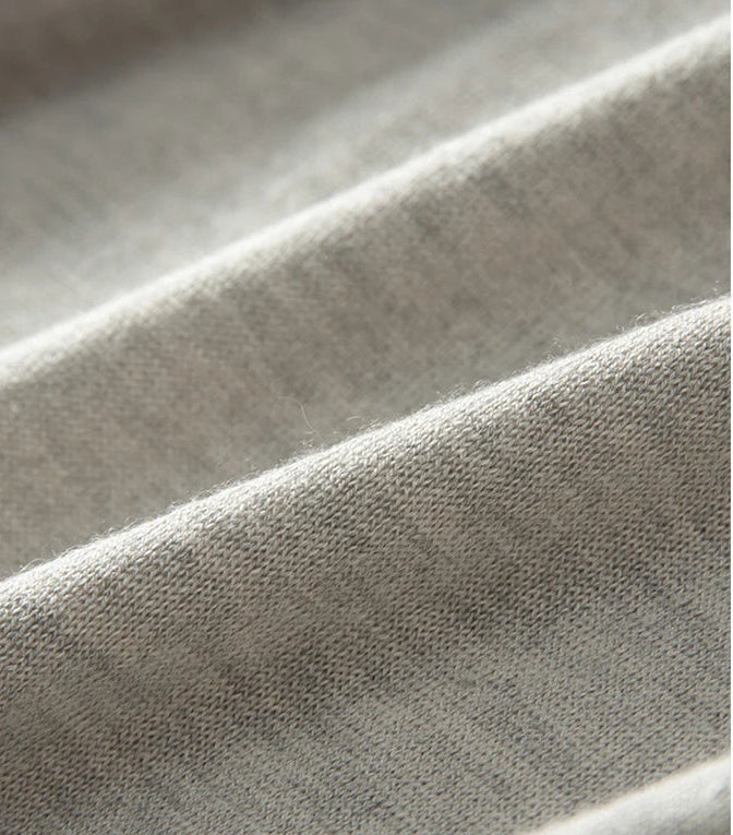 Men’s fine-knit silk-cashmere T-shirt in Silver Sand – wave fold reveals the soft, fluid texture of the knit. From Borcelleclothes.