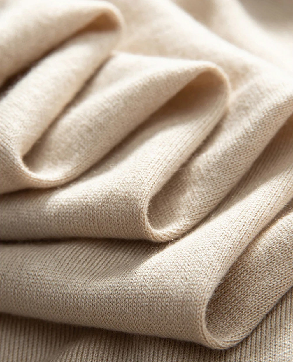 Men’s fine-knit silk-cashmere T-shirt in Soft Amber – wave fold reveals the soft, fluid texture of the knit. From Borcelleclothes.