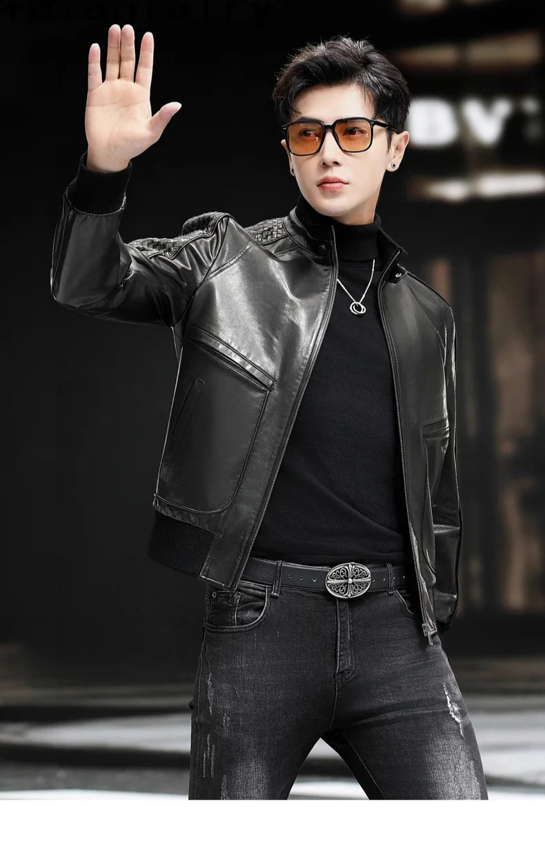 Model raises arm in men’s goatskin jacket; woven sleeve overlay and rib-knit cuff visible — From Borcelleclothes.