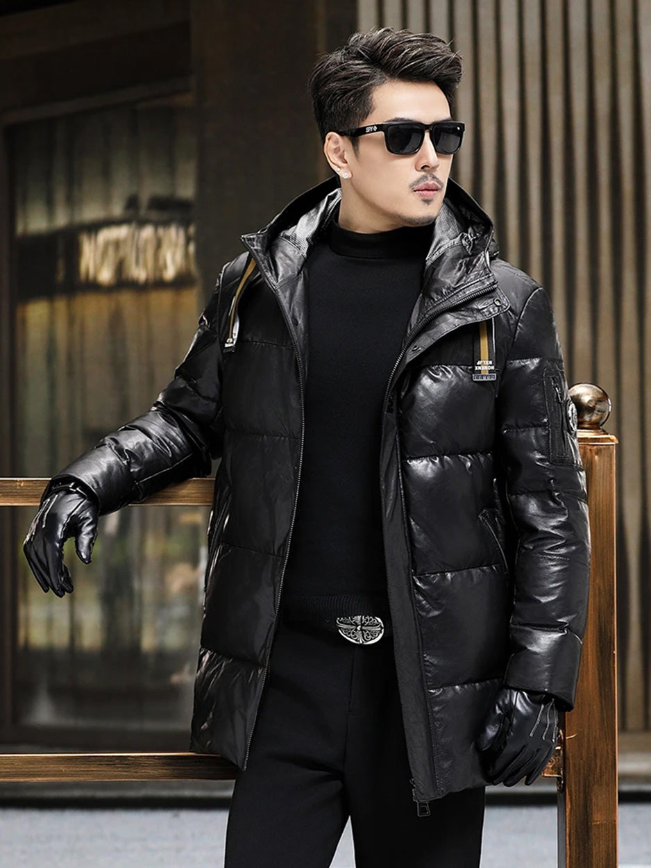 Model putting arm, sleeve construction detail; men’s Onyx goatskin down coat — From Borcelleclothes.