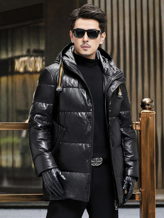 Front view, model standing straight in men’s Onyx goatskin down coat with hood belt — From Borcelleclothes.