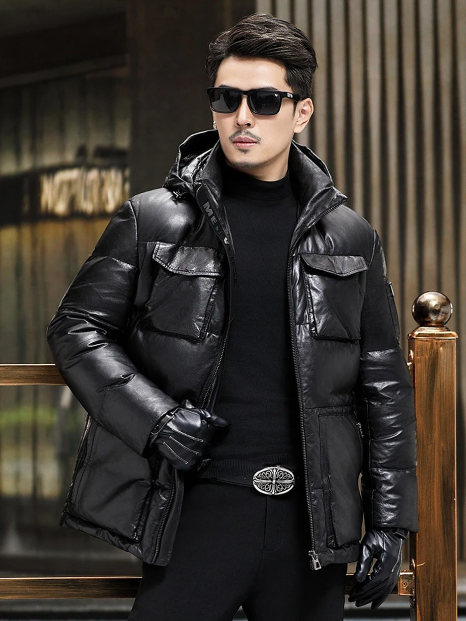 Unzipped goatskin down jacket in Onyx, model holding front edge — From Borcelleclothes.