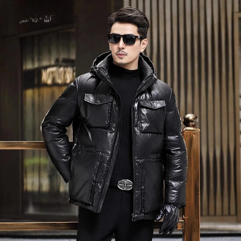 Men’s goatskin down jacket in Onyx with four cargo pockets, detachable hood, stand collar, and front zip closure. Slightly glossy finish. From Borcelleclothes.