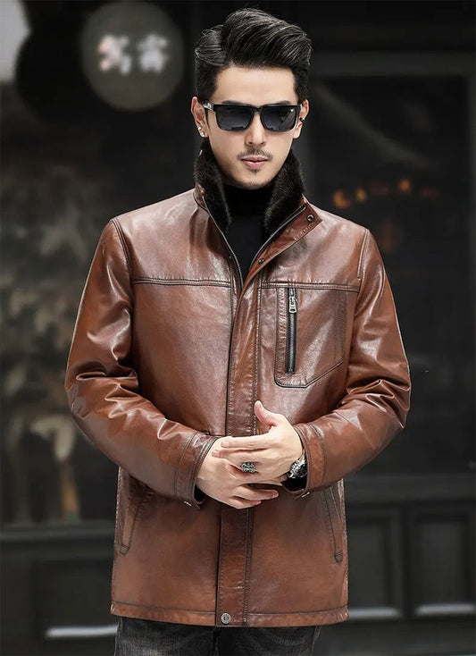Model wearing Autumn Crisp goatskin jacket, hands gently touching in front — From Borcelleclothes.