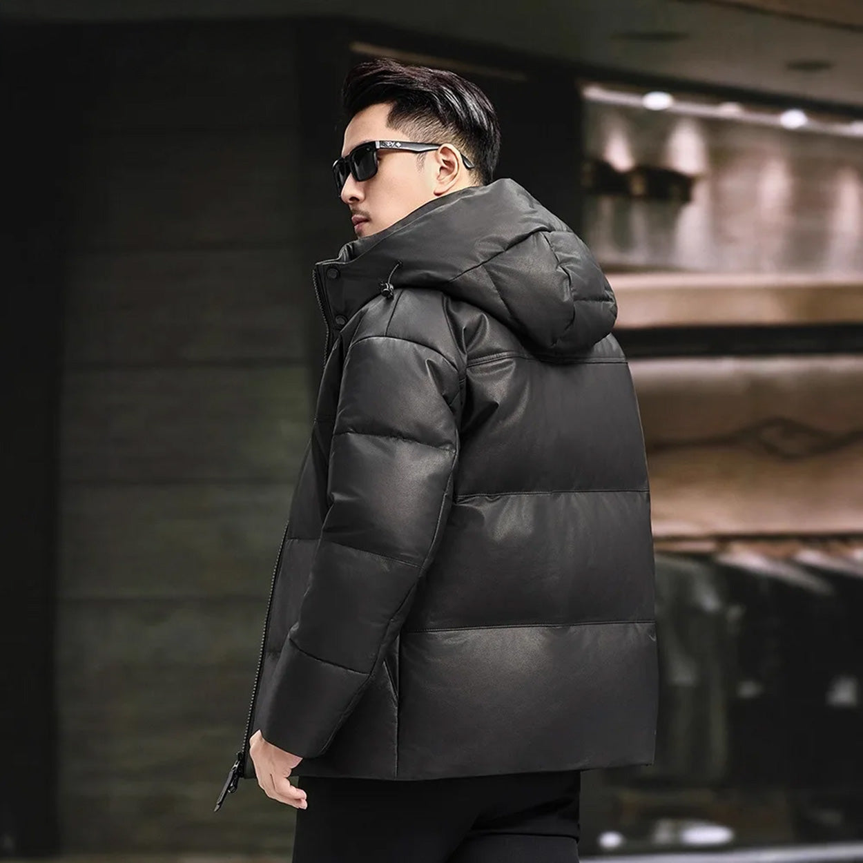 Back view of matte cowhide jacket in Abyss with integrated hood and back yoke — From Borcelleclothes.