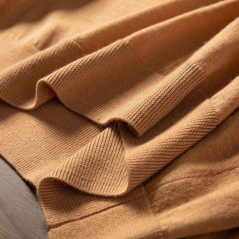 Bottom hem in 1x1 ribbed texture on the French Beige cashmere turtleneck — From Borcelleclothes.