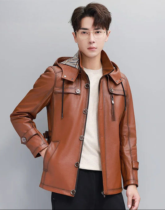 Men’s hooded cowhide leather jacket in Nutmeg — model with hand in waist pocket; zip-through stand collar and flap details visible. From Borcelleclothes.