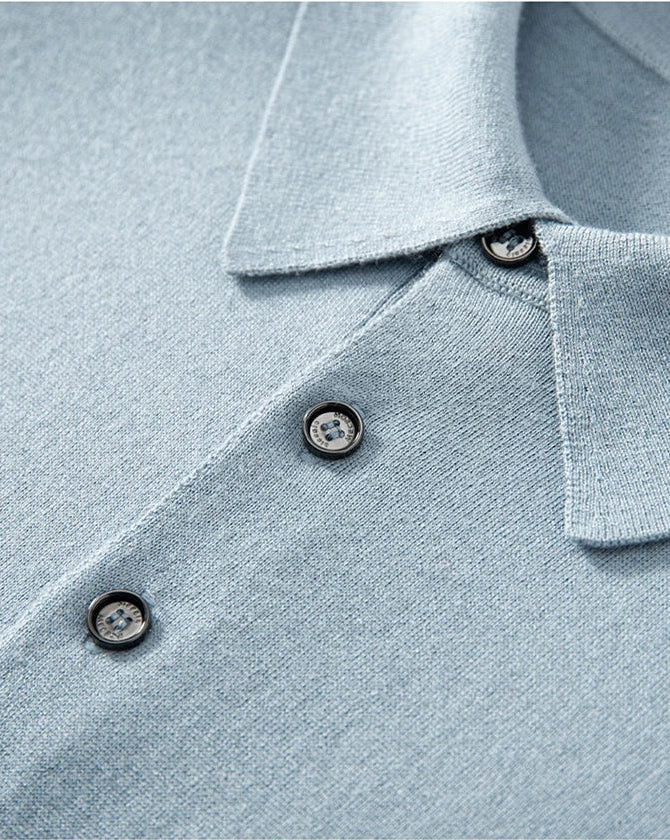Detail of the Echo Blue silk-cashmere polo — showing the placket and wide collar resting fluidly. From Borcelleclothes.