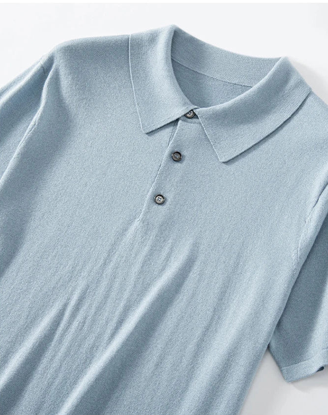 Upper section of the Men’s knitted silk-cashmere polo shirt in Echo Blue — featuring a soft drape and wide collar that rests gently on the shoulders. From Borcelleclothes.
