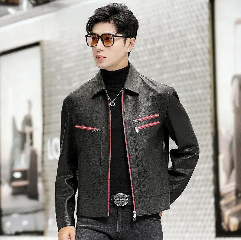 Model in a black goatskin leather jacket with Carmine Pink zipper accents, one hand placed behind the back — From Borcelleclothes.