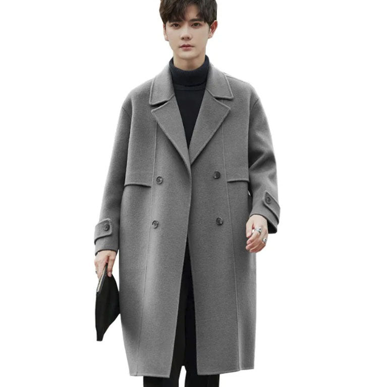 Men's Luxurious Double-Faced Coat in Concord—crafted from a blend of Merino wool and cashmere. This double-breasted design features horn buttons, notch lapels, and precise tailoring, embodying balance and refinement. From Borcelleclothes.