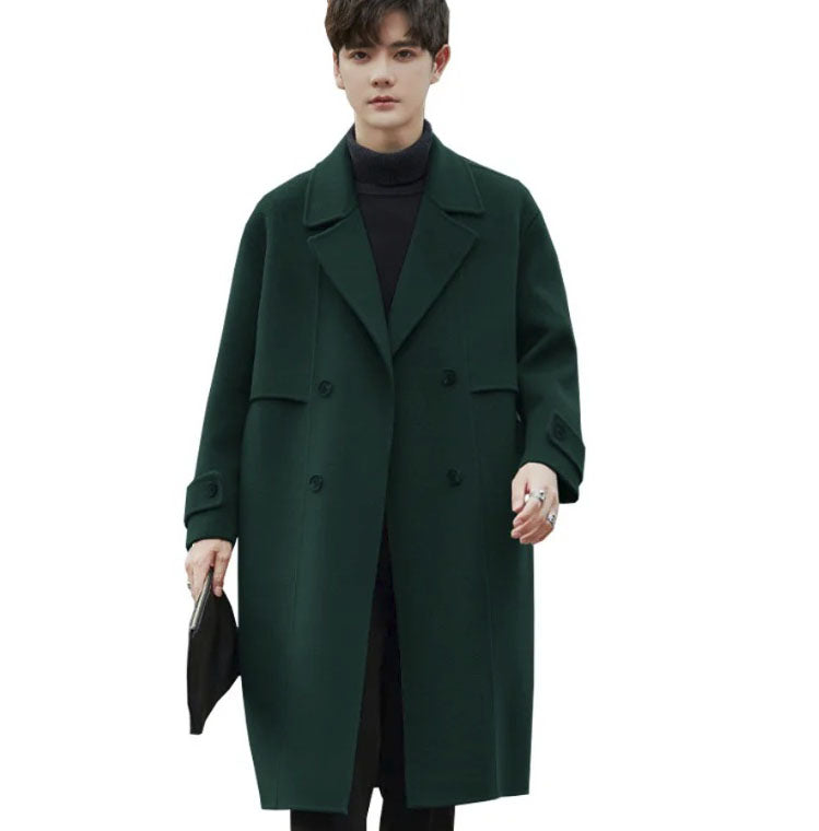 Men's Luxurious Double-Faced Coat in Deep Fir—crafted from a blend of Merino wool and cashmere. This double-breasted design features horn buttons, notch lapels, and precise tailoring, embodying balance and refinement. From Borcelleclothes.