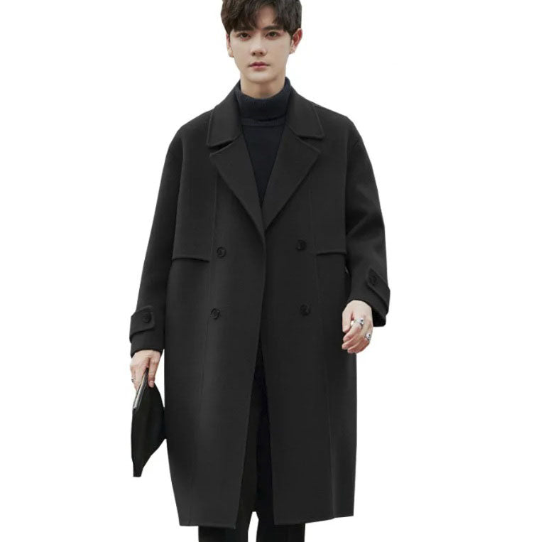 Men's Luxurious Double-Faced Coat in Onyx—crafted from a blend of Merino wool and cashmere. This double-breasted design features horn buttons, notch lapels, and precise tailoring, embodying balance and refinement. From Borcelleclothes.