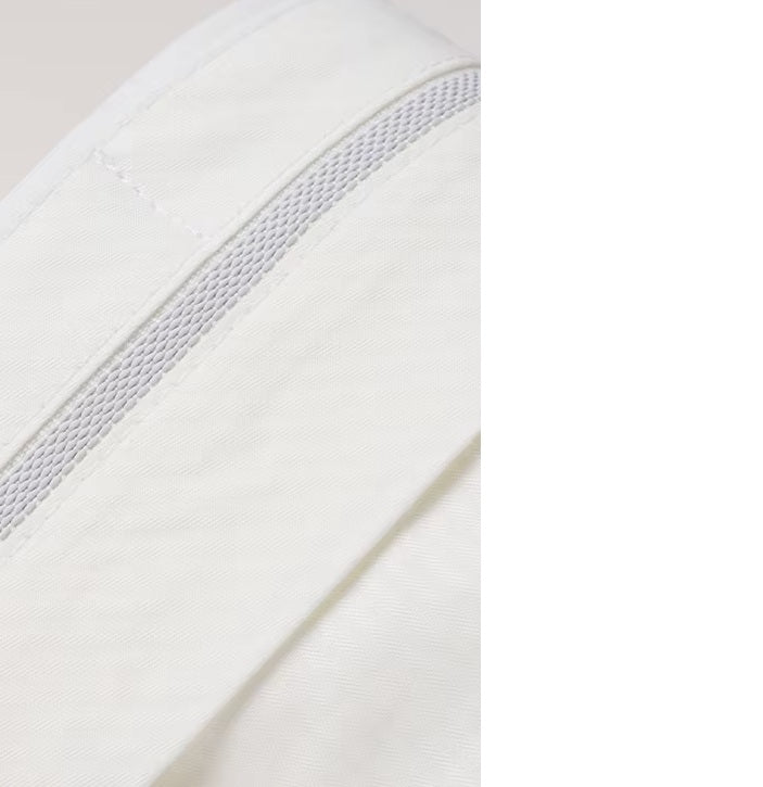 The Men's Luxury Alabaster Suit's pants waistband with gripper tape, designed to keep shirts neatly tucked. From Borcelleclothes.