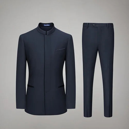 Men's Mandarin Collar Wool Ensemble in Ebony Clay, featuring a tailored silhouette with a sleek concealed placket, subtle satin accents, and straight-leg trousers for a modern, commanding look. From Borcelleclothes.
